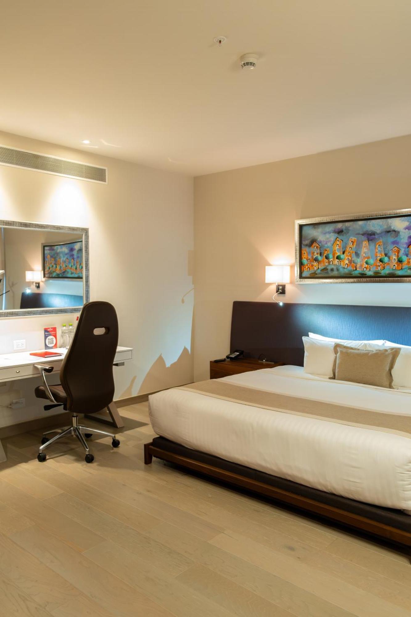Metria Hotel Leon Luaran gambar A room at the hotel