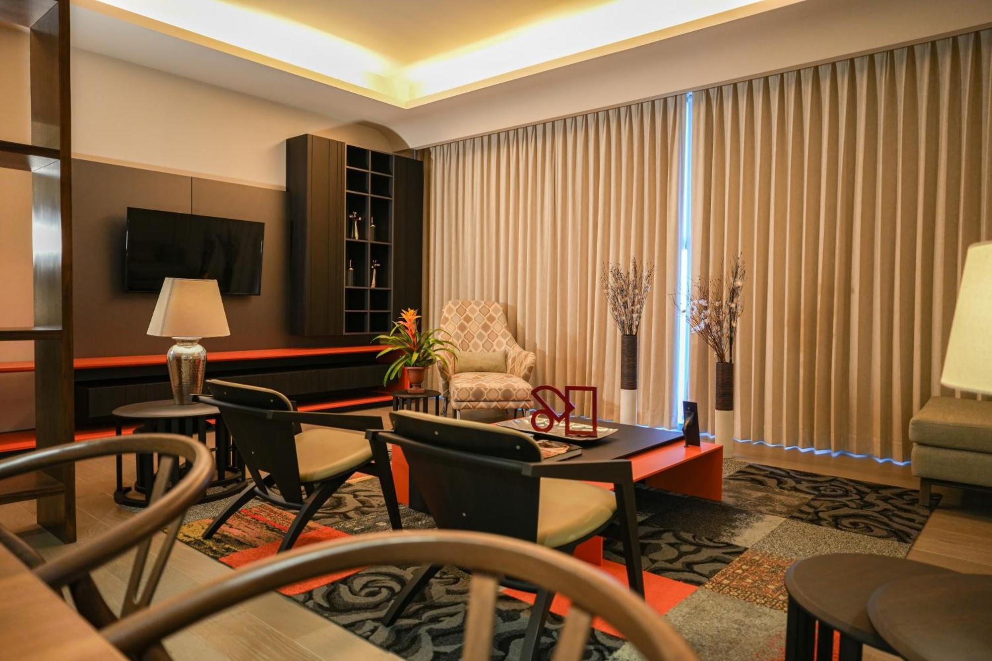 Metria Hotel Leon Luaran gambar A living room in a condominium